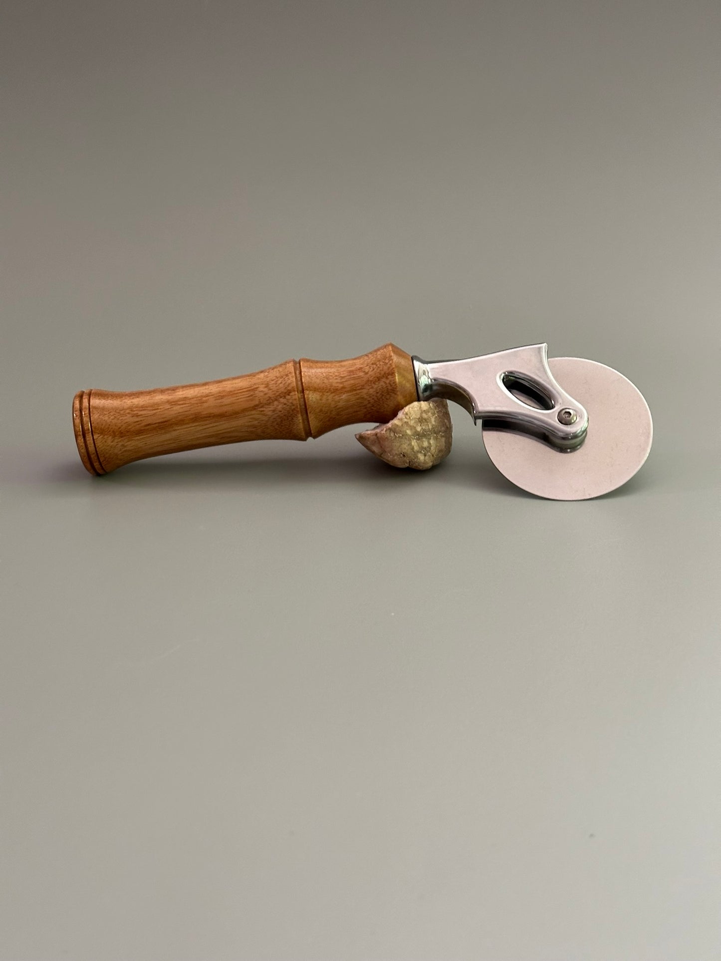 Elegant Precision – Hand-Turned Light Tulipwood Pizza Cutter with Stainless Steel Blade